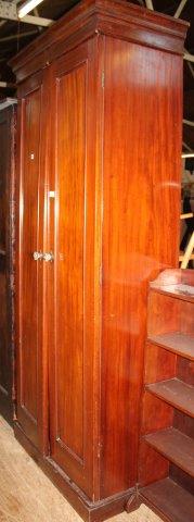 Tall mahogany 2-door cupboard